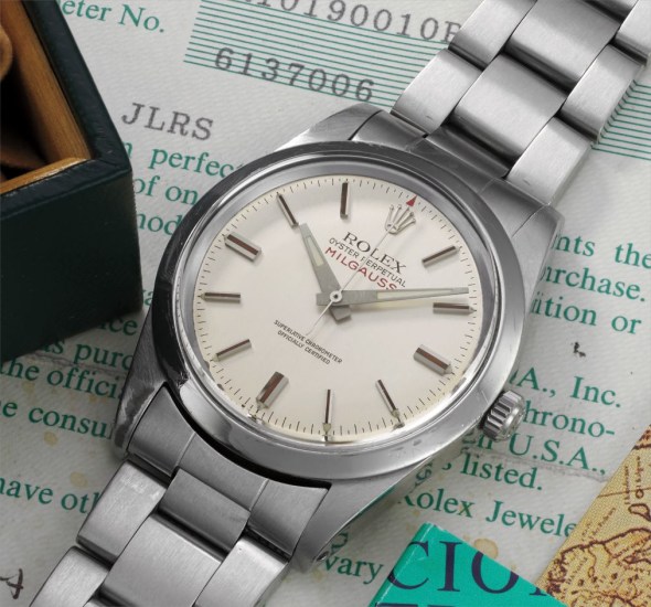 An attractive and rare stainless steel anti-magnetic wristwatch with centre seconds and silver dial with guarantee and box